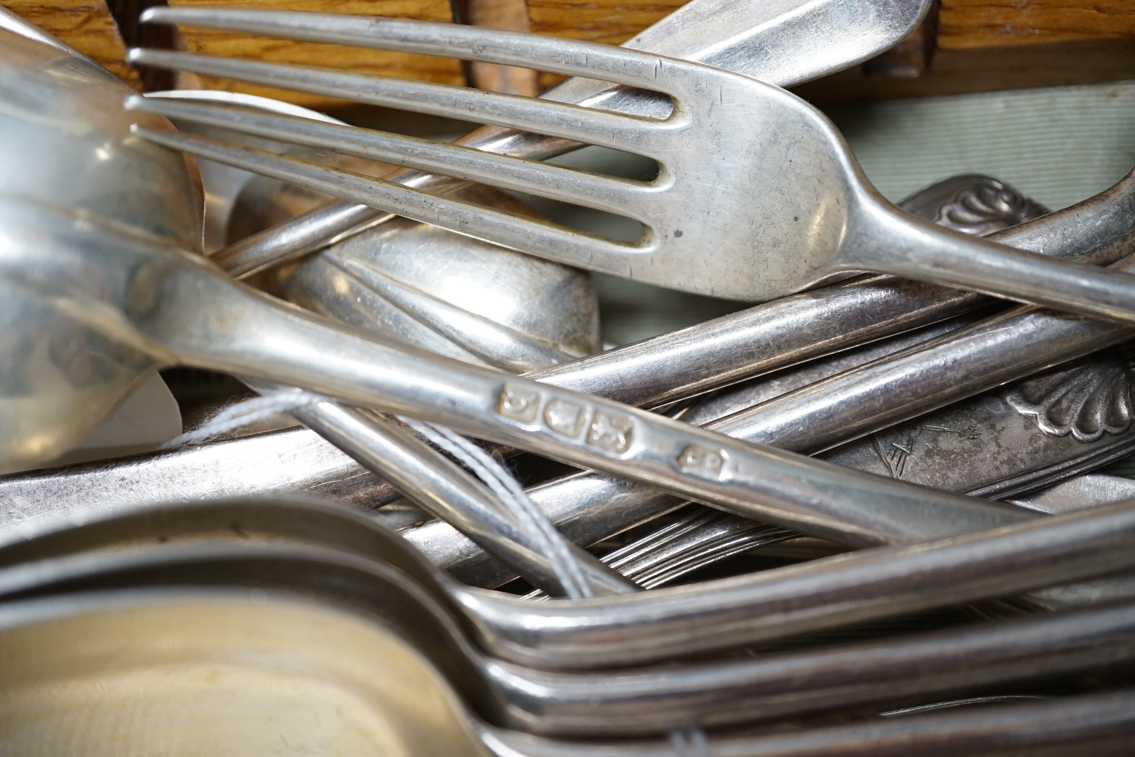 A part canteen of late Victorian silver rat tail pattern flatware, London, 1897, two other silver items of flatware and two plated items